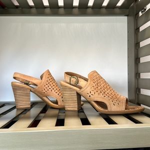 Born size 6 light tan heeled sandal. Adjustable